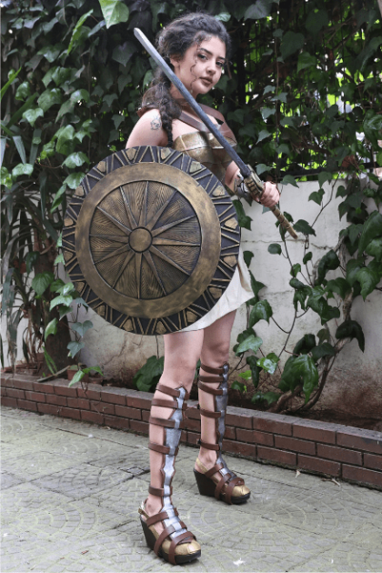 Front view of Amazon Princess Armor cosplay with shield and sword