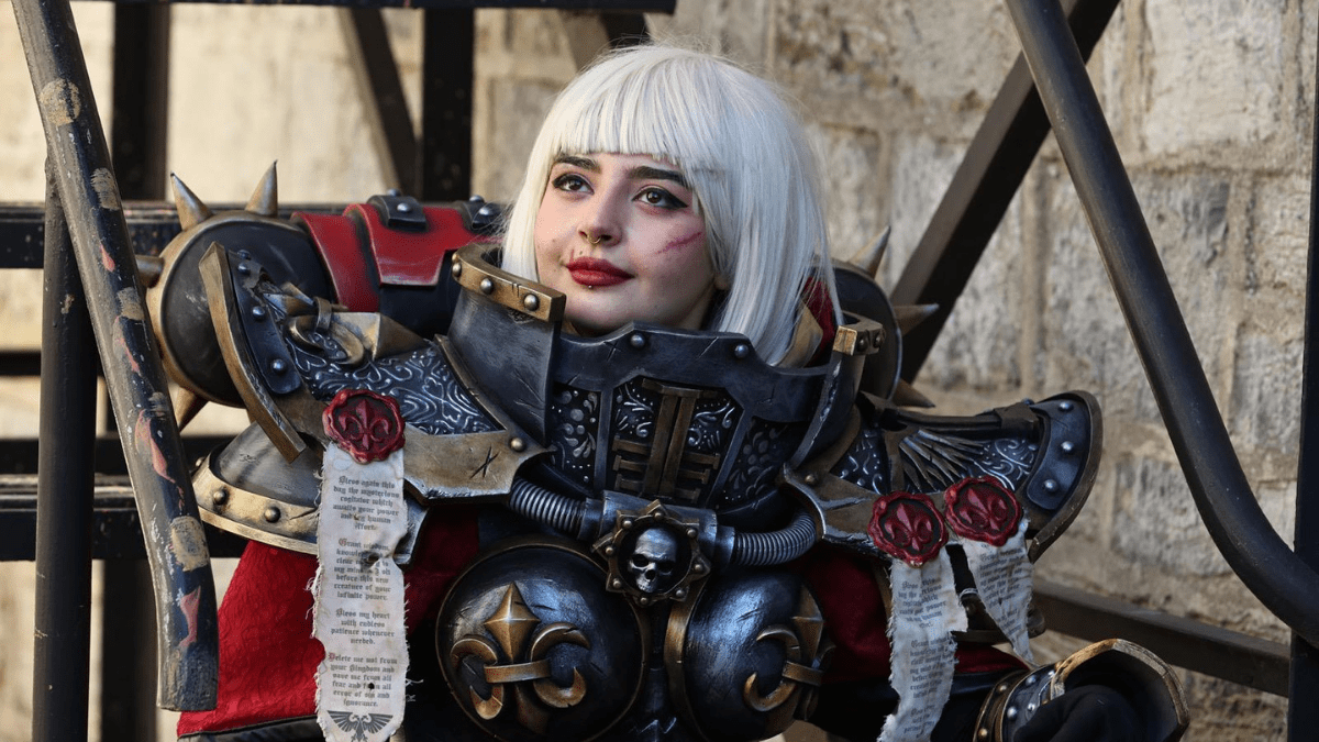 Cosplayer taking a break at a convention, wearing detailed EVA foam armor, staying comfortable and hydrated.