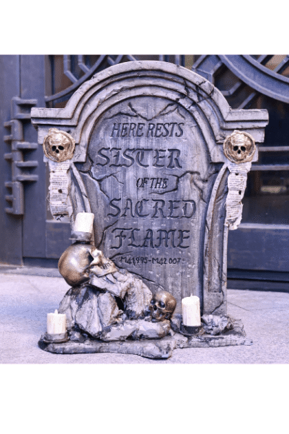 Front view of the Grave Stone Prop with lights off, showing styrofoam body and detailed 3D printed decorative elements.