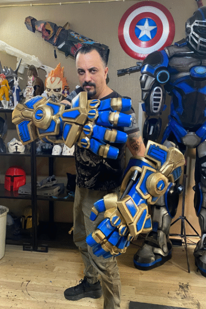 Cosplayer wearing Enforcer Gauntlets action pose